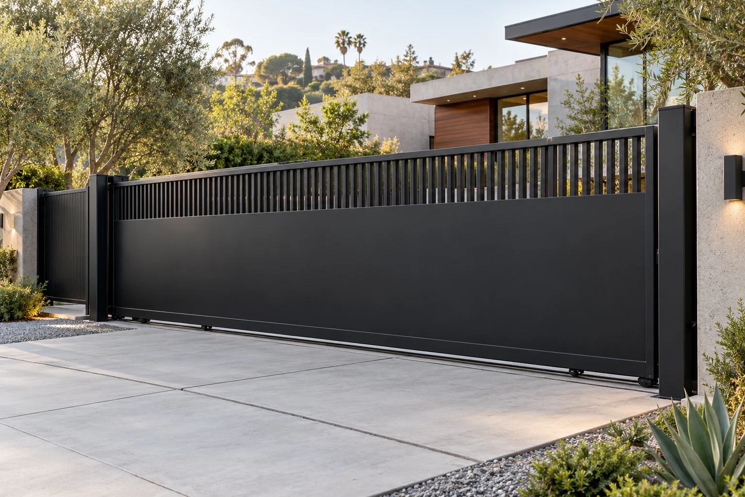 Design concept of a black powder-coated steel sliding driveway gate with sheet-metal privacy panels